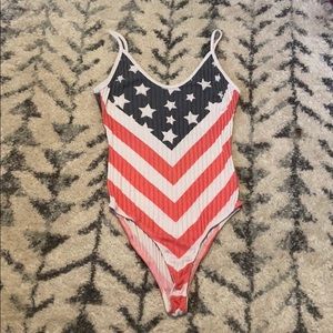 Charlotte these American flag bodysuit